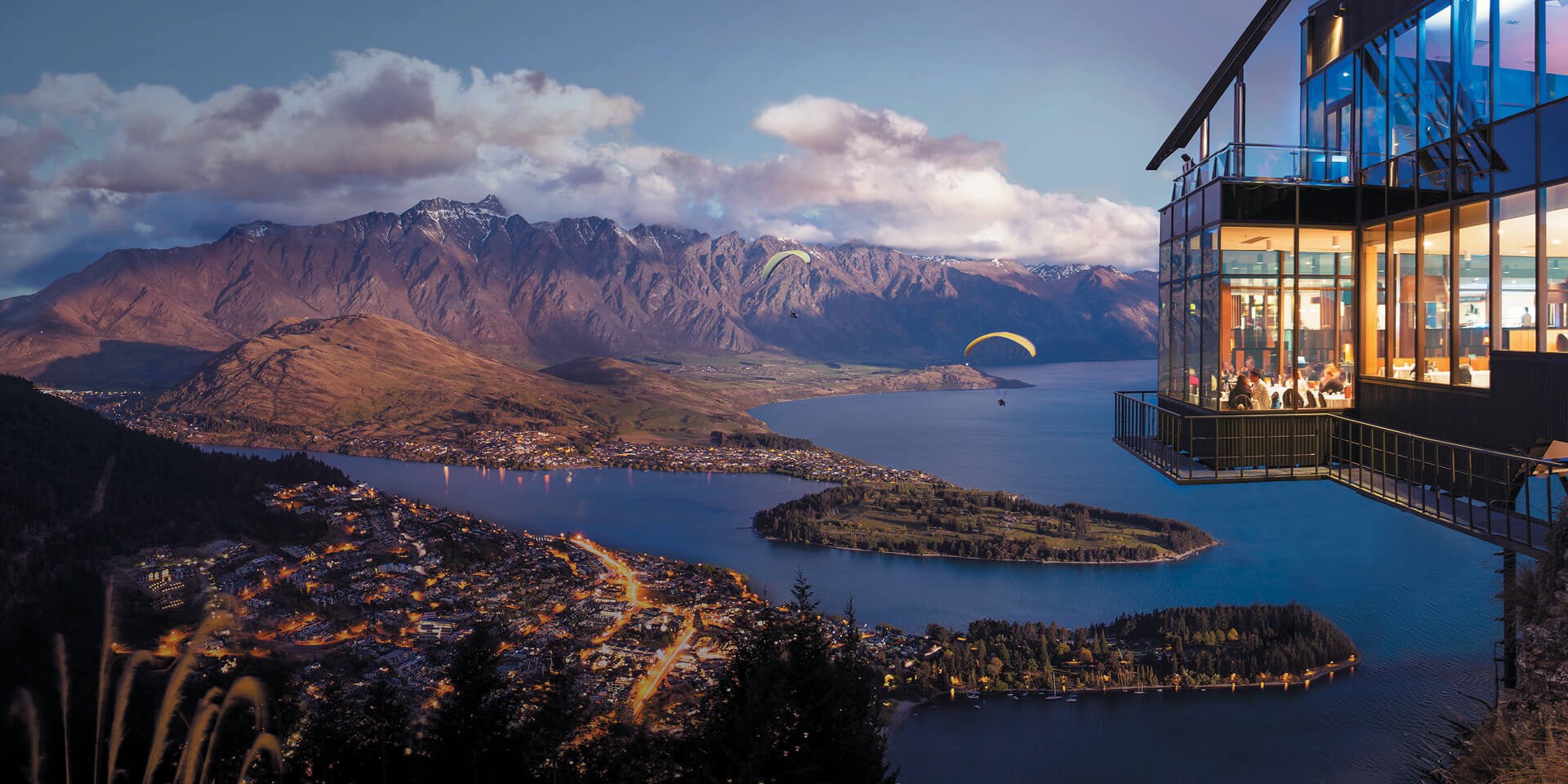 Skyline Queenstown Stratosfare Restaurant Sunset With Paragliders