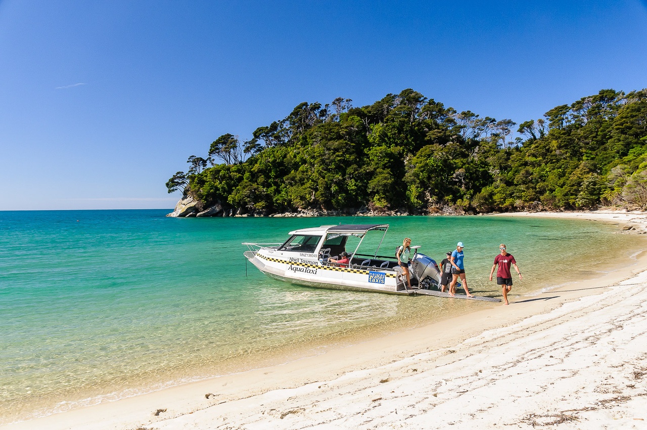 Abel Tasman Group Hopping Off Abel Tasman Aqua Taxi - Pic Courtesy Abel Tasman Aqua Taxi