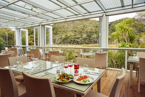 Conservatory and dining area at Awaroa Lodge - pic courtesy Awaroa Lodge